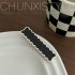 گیره مو سیاه و سفید
