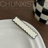 گیره مو سیاه و سفید
